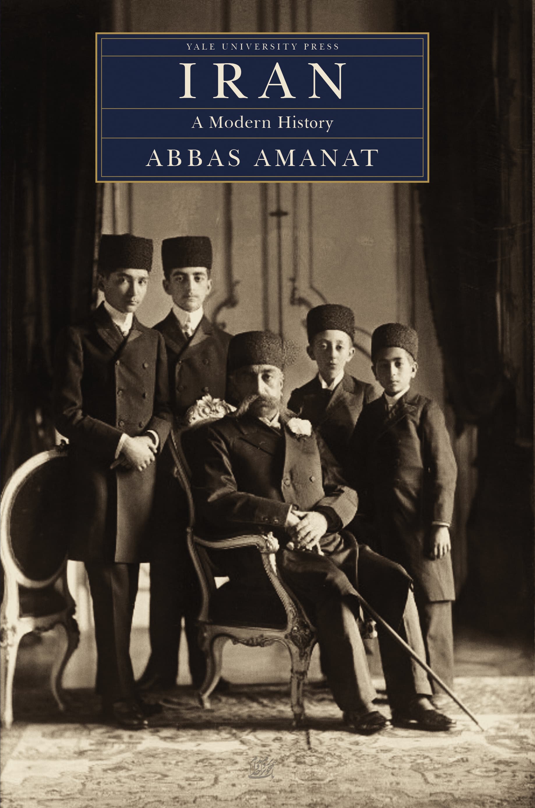 Front cover: sepia group portrait beneath a navy title panel with a gold border.